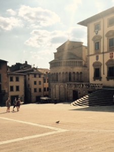 part of the Piazza Grande with a major many columned church.