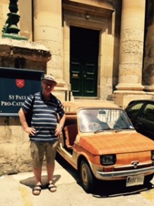 A very early convertible fiat outside St Paul's Anglican Cathedral