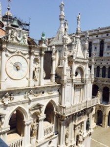 Ancient clock and statuary inside the Doge's Palace Venice from the 4th floor