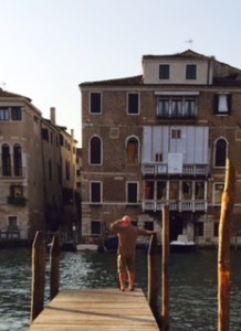 Richard looking for his private motor launch to arrive on the Grand Canal in Venice
