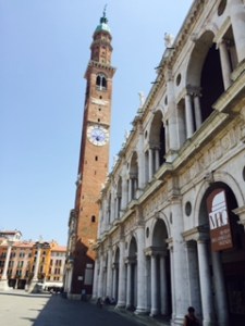 Basilica Palladio a building which was Palladio's first work in Vicenza and is effectively the town hall office with elegant shops in the colonnade below. It has a gleaming green copper roof
