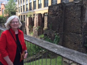 Ann in front of ancient Roman walls in London revealed recently after excavations for a new building
