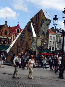 Bruges Markt Square..a modern installation against ancient guild houses and many tourists!