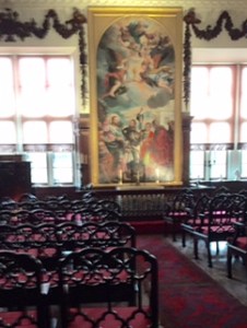 Permanent chapel set up with amazing carved seats.