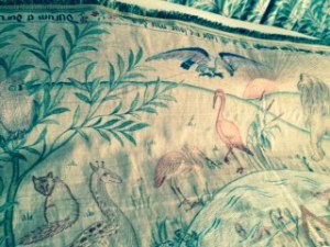 Cot quilt with animal designs currently on loan to Kelmscott Manor