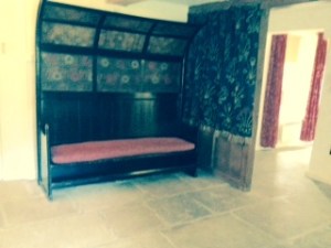 Original settle designed by Morris for the Red House now in Kelmscott Manor