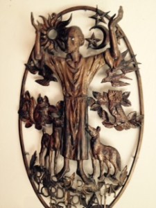 Memorial bronze of Francis of Assisi in Llandaff Cathedral Cardiff