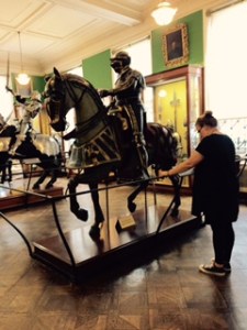 Naomi looking for a knight in shining armour at the armoury section of the Wallace Collection at Hertford House in Manchester Square London