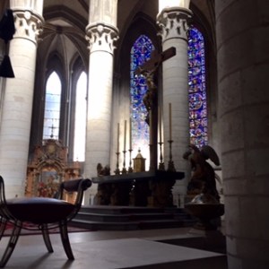 Elegant stained glass in Rouen Cathedral behind the main sanctuary; Photography does not do it justice