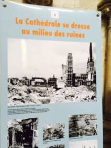 Display showing the extent of WW11 damage in Rouen with the Cathedral relatively unscathed whilst all around is flattened.