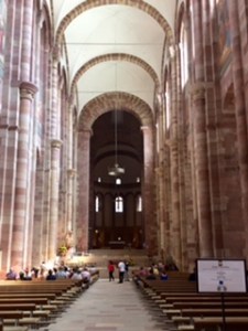 Speyer Cathedral interior ..very plain, no stained glass, very little statuary, modern communion tables.