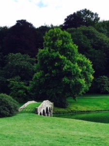 Stourhead House gardens with bridge over the lake