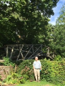 Wightwick Manor garden with bridge over the main road to the forest
