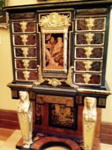 love the cabinets ..cannot stay away from the extraordinary workmanship in these units. This I think is Bouille but I have seen too many to be sure