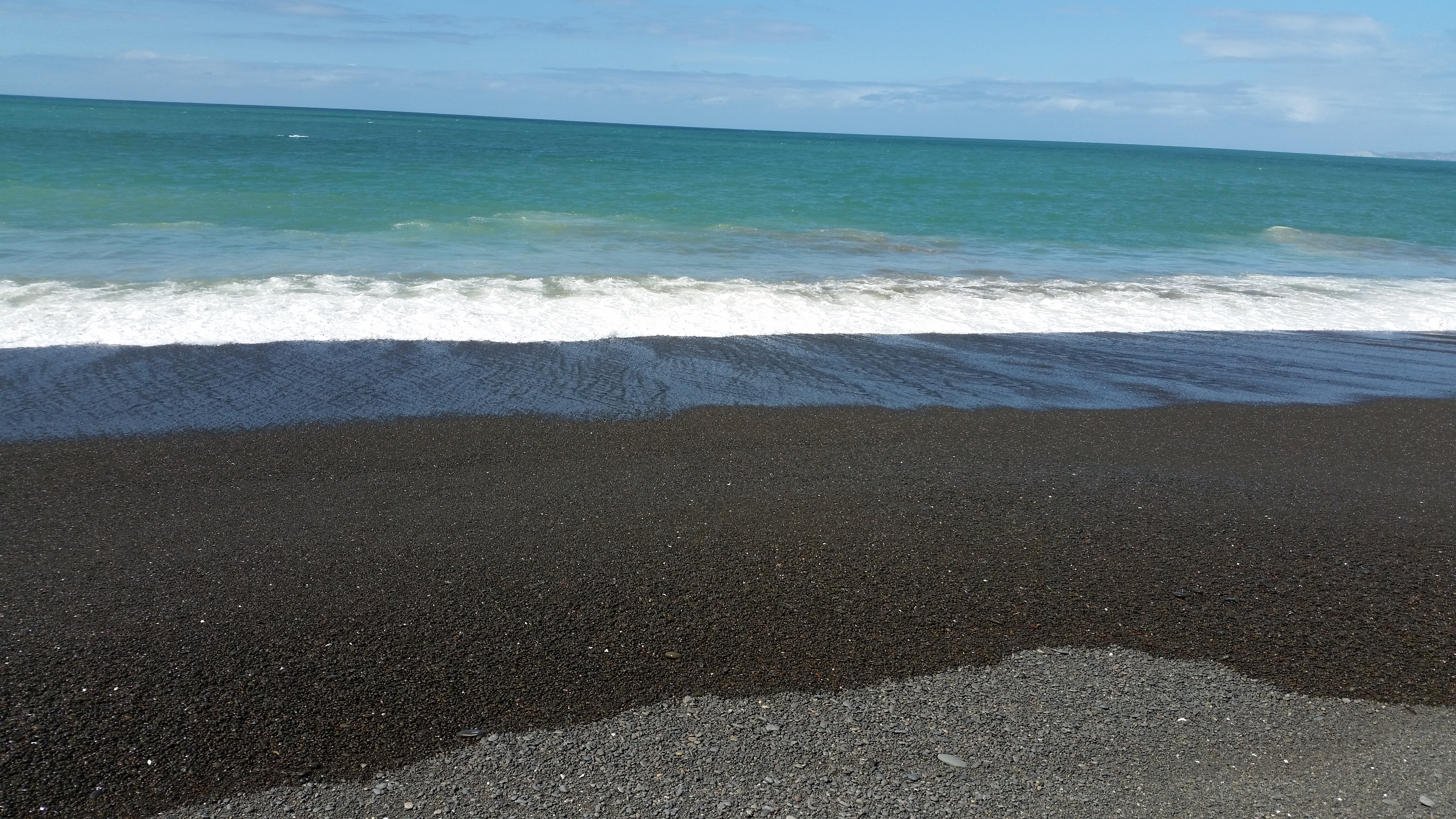 NZ Napier black stone surf beach